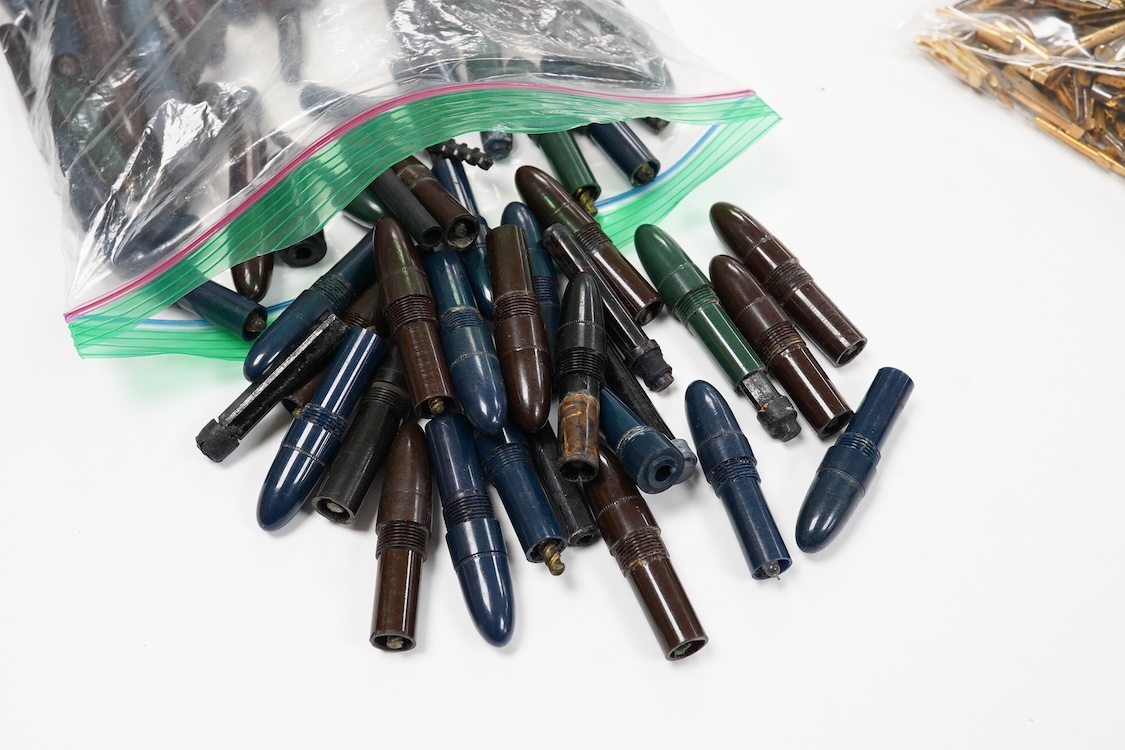 A selection of fountain spares to include levers, blind caps and nibs, some gold